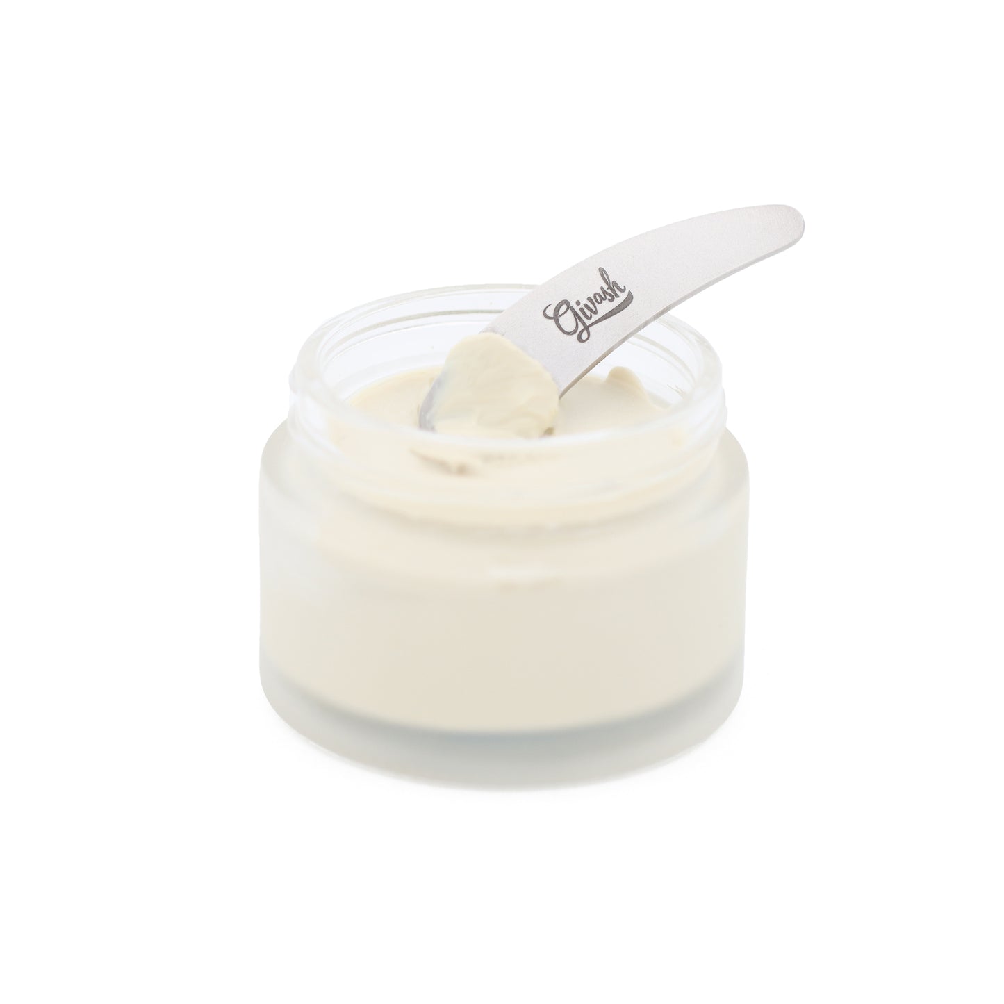 Givash stainless steel spatula scoop shown in an open deodorant jar with deodorant cream on it. Shot on a white background.